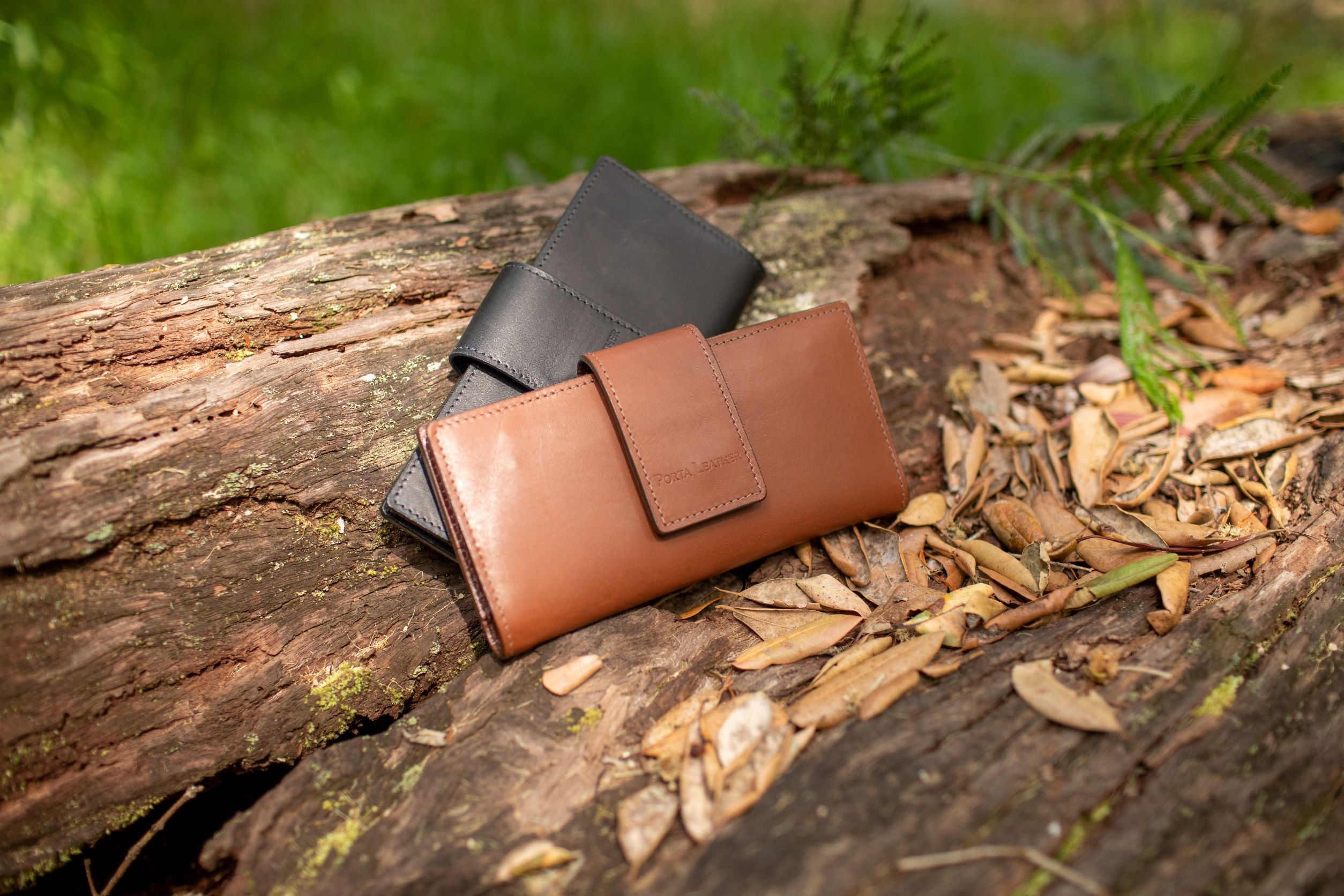 Porta Leather Long Wallets in Black and Brown in Australian bush setting