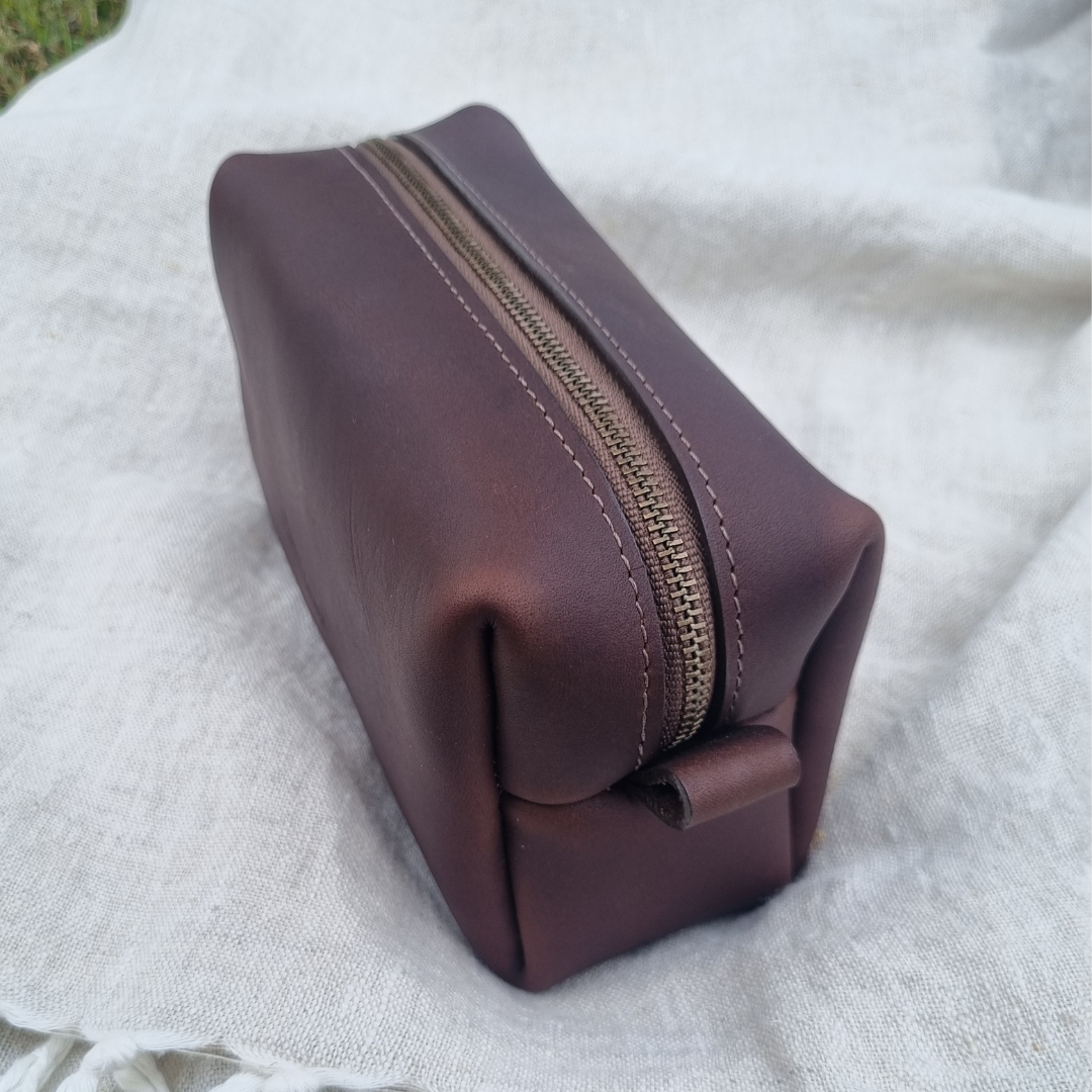 Side view of Porta Leather Dopp Bag in Heritage Dark Brown