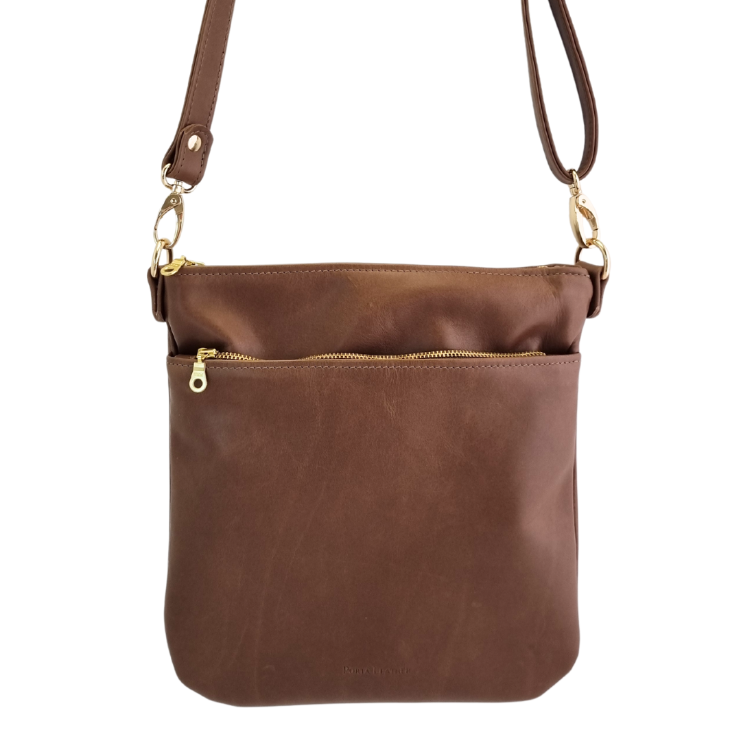 Porta Leather Harper Crossbody Bag in brown with gold hardware
