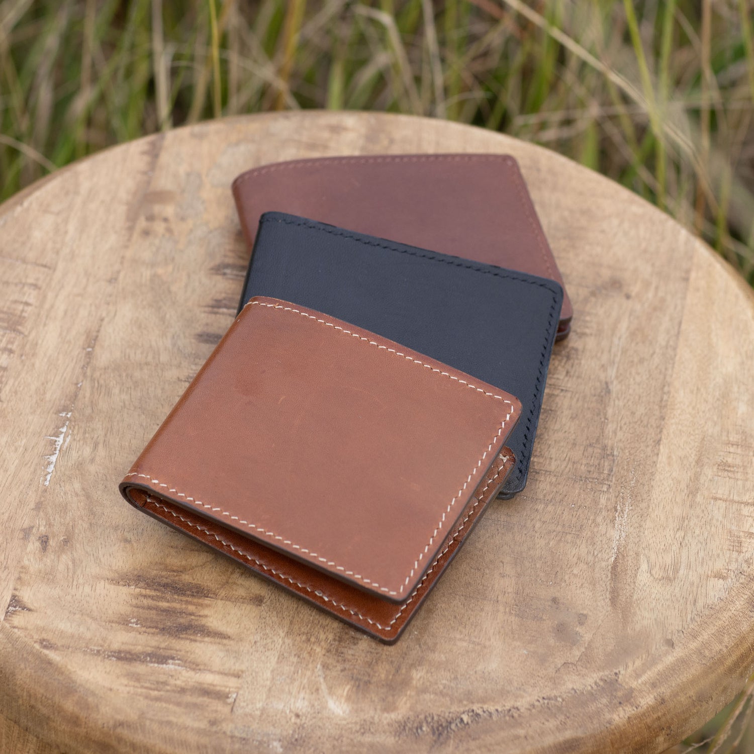 Porta Leather wallets in black, cognac and brandy part of the For Him range