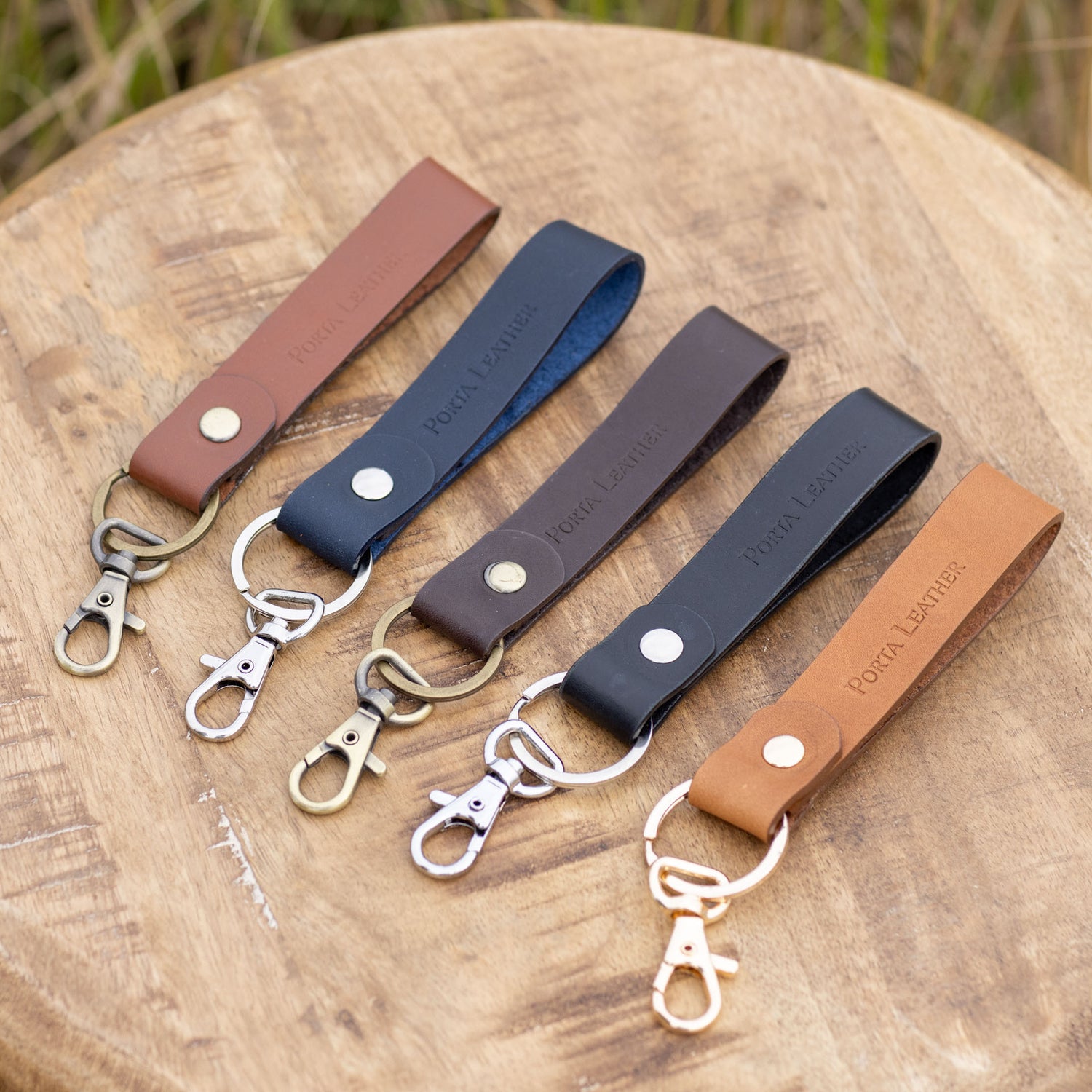 Range of Porta Leather classic keyrings in black, brown, tan and navy as the Accessories range