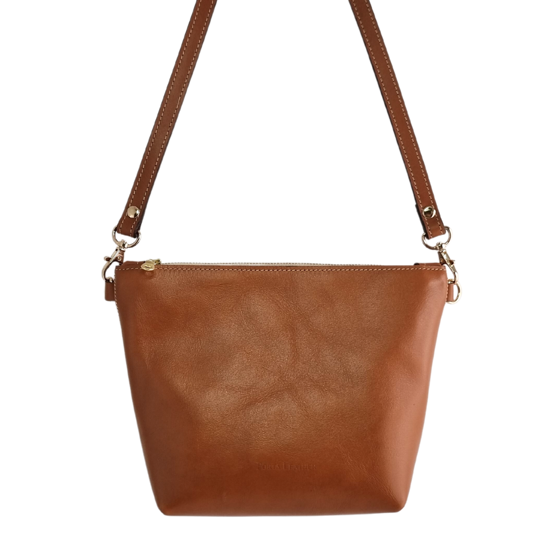 The Porta Leather Ava Crossbody Bag in Tan with Gold Hardware