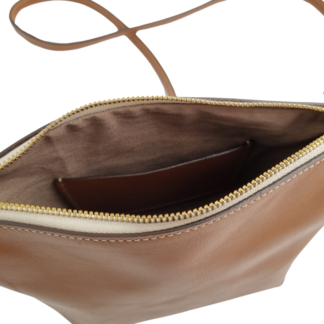 Open view of the Porta Leather Ava Crossbody Bag in Tan with Gold Hardware