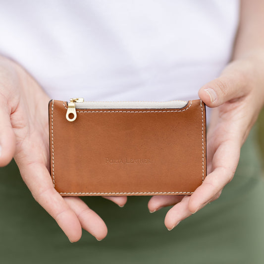 Front view of Bella Pouch in tan