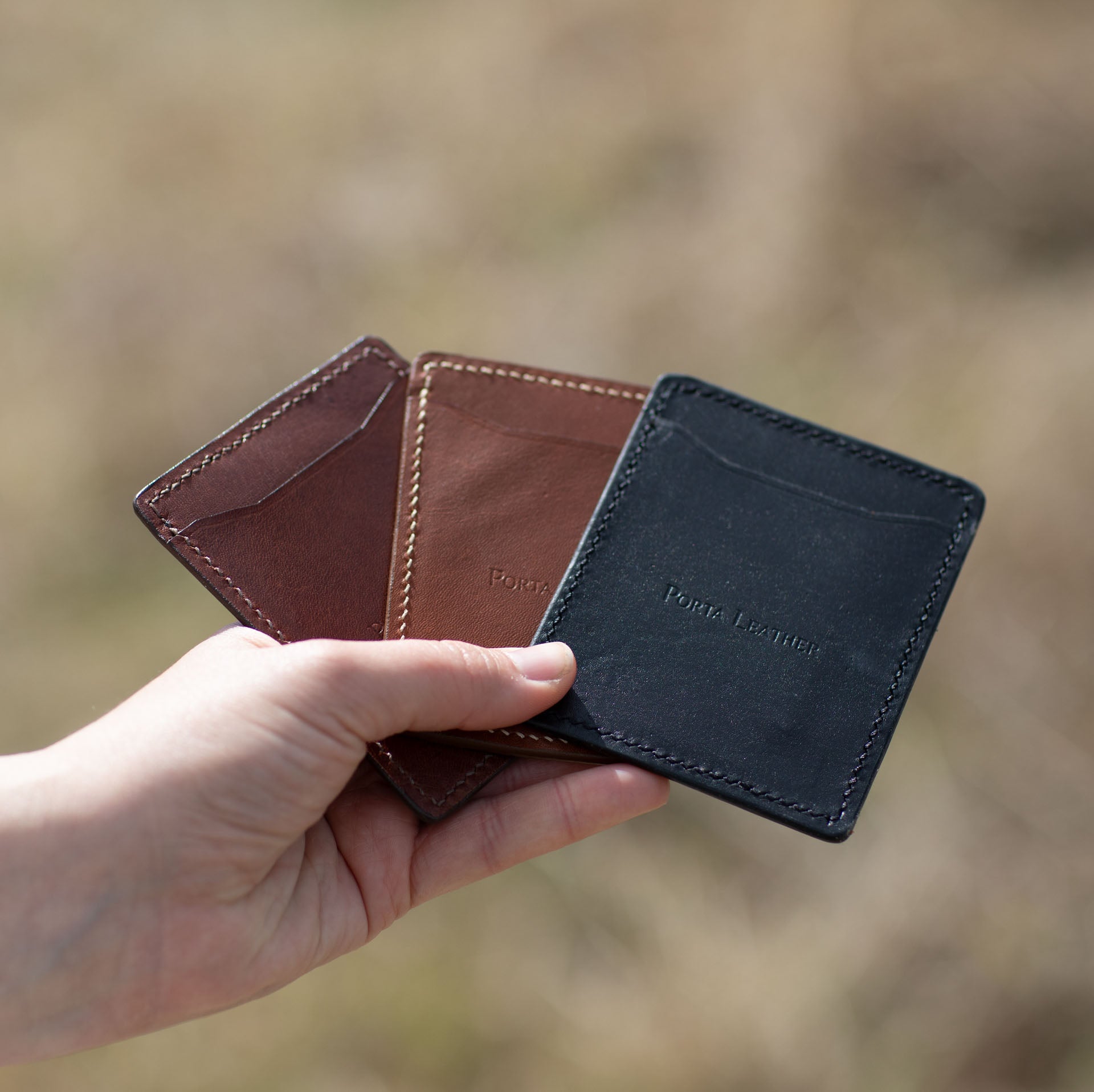 Porta Leather card slip range including, black, cognac and brandy