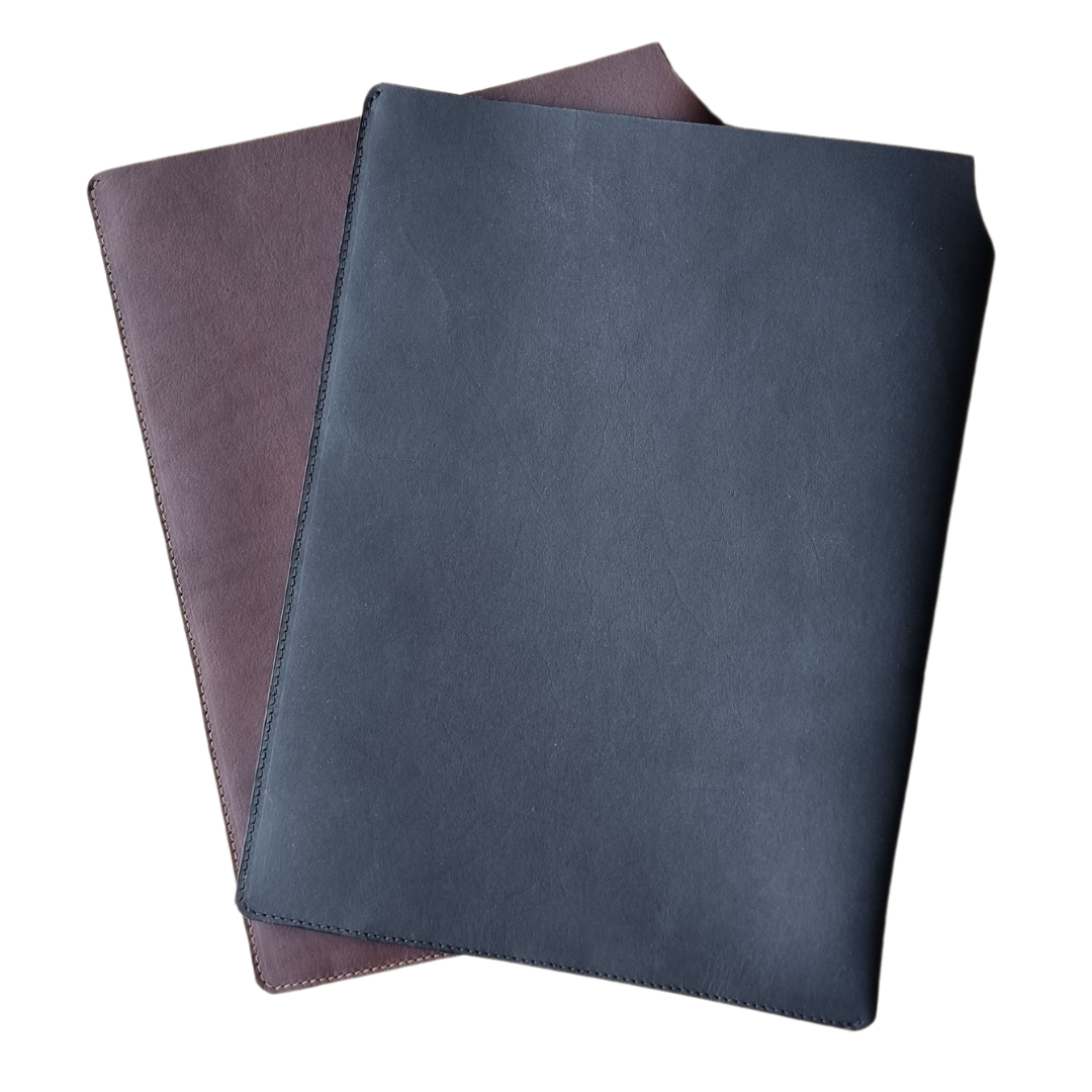 Porta Leather laptop and tablet slip range in Heritage Black and Heritage Brown