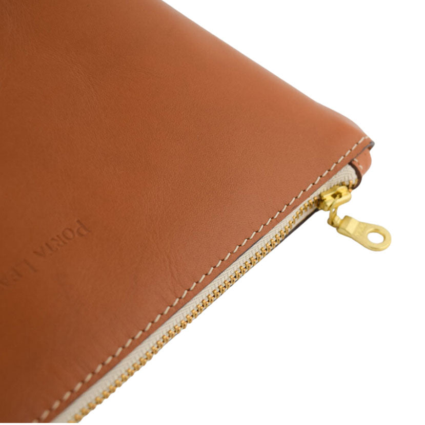 Close up view of Porta Leather Carry Pouch in tan